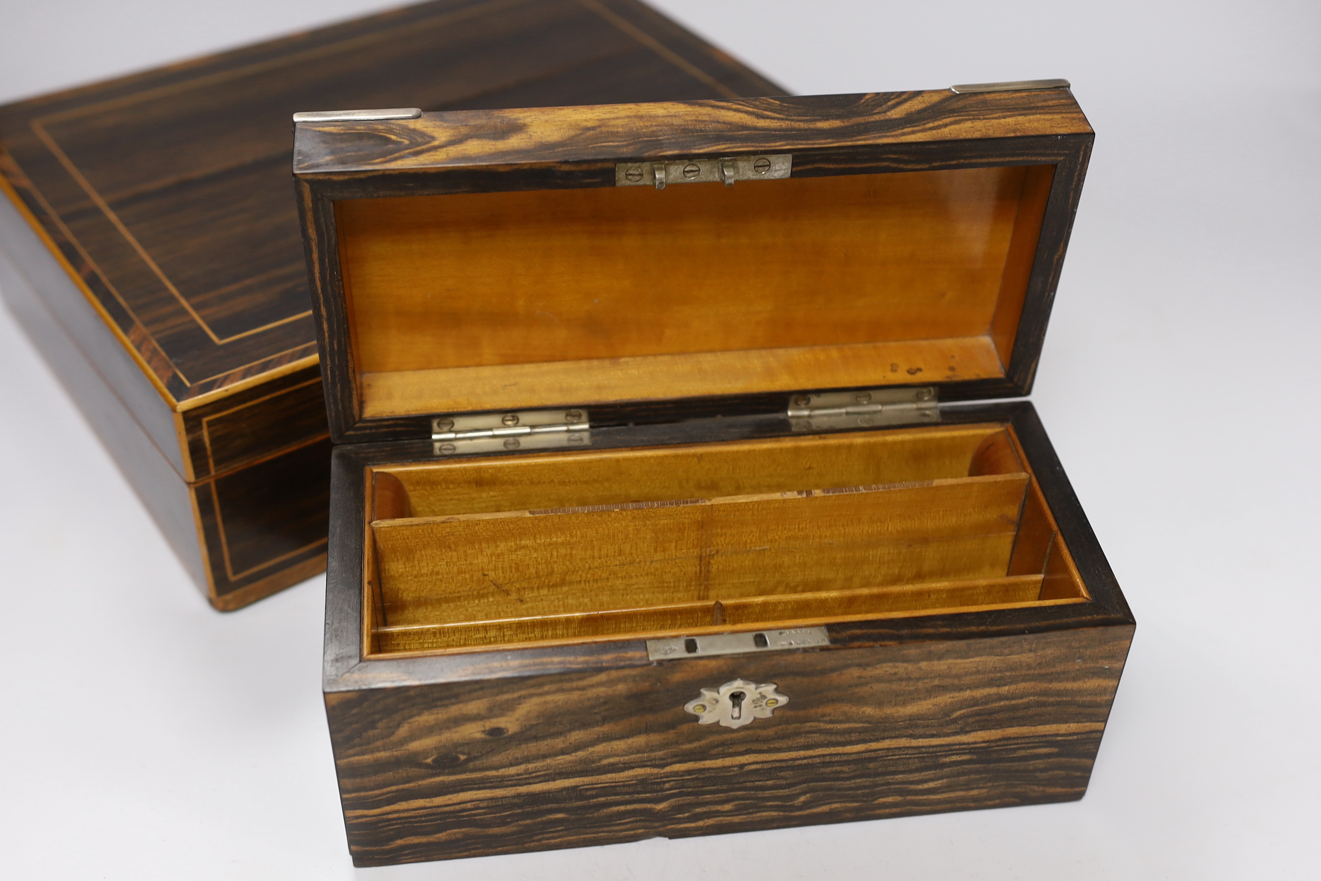 A 19th century coromandel writing slope with bone lock escutcheon and a Victorian silver mounted stationery box, largest 30cm wide